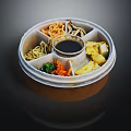 Round Divided Lunch Box With Noodles Vegetables Tofu And Central Sauce