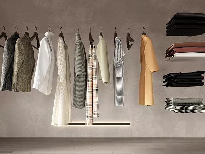 Stylish Clothes Hanging On Racks With Folded Garments Against Gray Wall And Wooden Floor 3d model