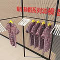 Plaid Shirts Hanging On White And Yellow Hangers Display Rack 3D Model Series