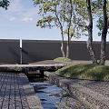 Serene Feature Wall In Garden With Trees Stone Path Stream And Grass Area