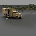 Military Green Utility Truck With Ladder And Field Tent Under Net Cover