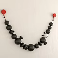 Modern Wall Decor With Black Balls Red Circles And Hanging Design Elements 3d model