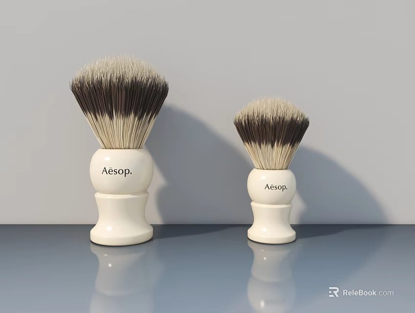 Aesop Shaving Brushes With White Base And Brown White Bristles On Grey Surface 3d model 