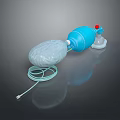 Manual Resuscitator Device With Blue Main Body White Airbag Green Tube And Mask