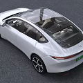 Light Gray Electric Car With Transparent Roof And Green License Plate