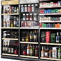 Retail Display Shelves with Multiple Layers of Assorted Bottled and Canned Goods