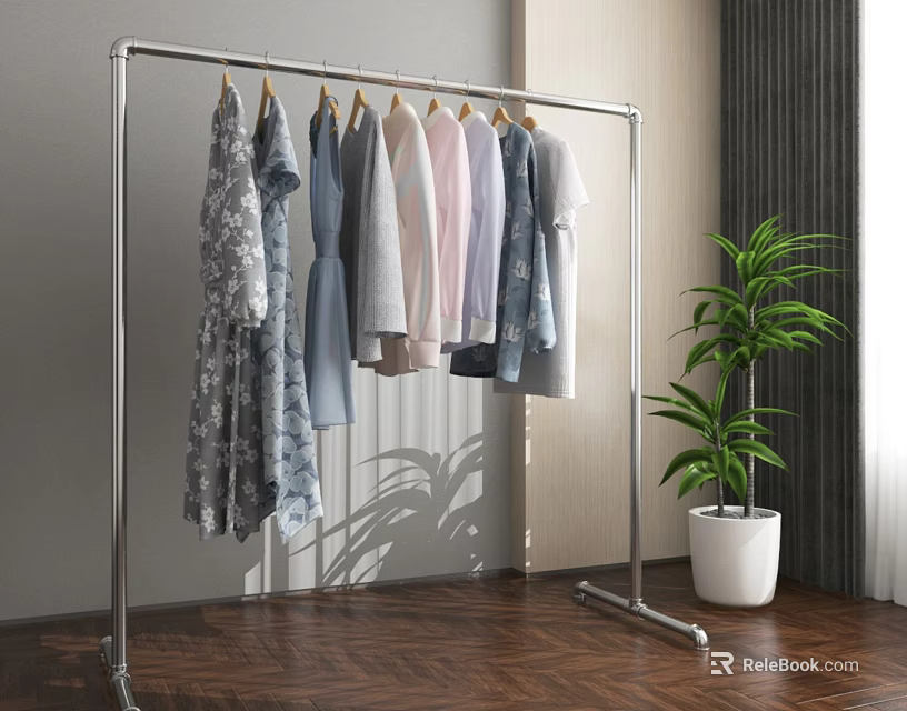 Metal Clothes Rack With Hanging Clothes And Potted Plant On Wooden Floor 3d model 