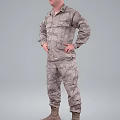 Game Movie Character in Camouflage Military Uniform with Hands on Hips Standing Against Gray Background