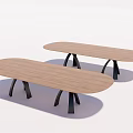 Two Oval Shaped Wooden Dining Tables With Black Metal Legs Design