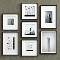 White Framed Black And White Architectural Photos On Gray Wall Gallery