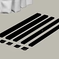 Long Black Decorative Strips And Small Square Pieces With Holes