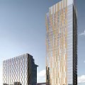 Modern High Rise Hotel Building Featuring Glass Curtain Wall And Golden Facade Against Blue Sky