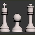 Three Shiny Metallic Chess Pieces With Elegant Reflective Polished Surfaces