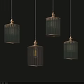 Four Hanging Pendant Lights With Green And Yellow Gradient Cylindrical Striped Shades On Dark Wall