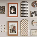 Gallery Wall With Various Framed Artworks And Decorative Patterns 3d model