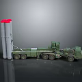 Military Vehicle Transporting Large Cylindrical Launchers With Red Top Sections