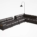 Modern Black Leather Sectional Sofa With Contemporary Design And Floor Lamp In Living Room