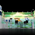 Colorful Exhibition Booth With Green Nature Backdrop Cartoon Characters Tables Chairs And Display Screen