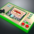 Classic Game Boy Handheld Electronic Device Displaying The Legend of Zelda With Green Gold Design