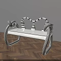 Unique Public Chair With Black And White Striped Curved Arms And White Seat