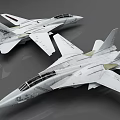 Two White Military Fighter Jet Models With Sleek Design And Markings