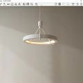 Modern White Circular Pendant Light With Warm Glow Against Neutral Wall 3d model