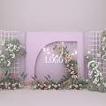 Elegant Photo Check In Spot Featuring Pink Background White Flower Walls And Decorative Arch