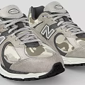 Gray New Balance Sneakers With Camouflage Pattern And White Black Sole