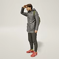A Man With Hand Over Eyes In Gray Jacket Green Backpack And Red Shoes