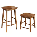 Two Simple Wooden Stools With Tall And Short Designs For Home Decor