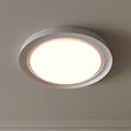 Modern Round White Ceiling Light with Simple Design Illuminated in Interior Space