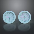 Two White Round Analog Clocks Household Electrical Appliances With Clear Dials And Pointers
