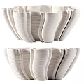 Modern White Ceramic Vase With Curved Texture And Fresh Flower Arrangement For Home Decor