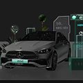 White Mercedes EQE Electric Vehicle Display With Green Plants And Brand Signage