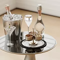 Elegant Bar Setup With Silver Tray Ice Bucket Champagne Bottle Wine Glasses And Small Tins