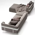 Comfortable Modern Gray Sectional Sofa With Plush Pillows And Striped Blanket 3d model