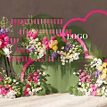 Vibrant Floral Event Backdrop With Pink Structures Mixed Flowers Greenery And LOGO 3d model