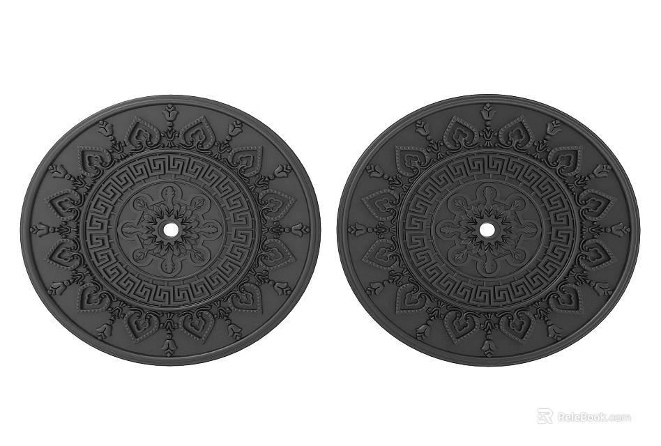 Two Black Circular Ornate Carvings Featuring Intricate Geometric Patterns 3d model