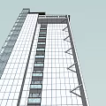 Modern High Rise Building Exterior With Glass Curtain Wall And Landscaped Surroundings