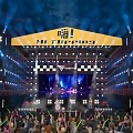 Vibrant Live Music Festival Stage With Bright Lights And Audience Light Sticks