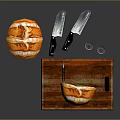 Fresh Homemade Bread on Wooden Cutting Board with Knives Grater and Salt Pepper Shakers