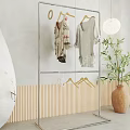 Iron Clothes Rack With Minimalist Design Hanging Clothes Scarves And Clips On White Background