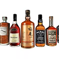 Display of Various Branded Liquor Bottles Featuring Hennessy Jack Daniels and Other Labels Arranged