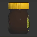 Marmite Yeast Extract Jar With Yellow Lid On Black Reflective Surface