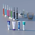 Assorted Oral Care Products Including Electric Toothbrushes Toothpaste And Glass Cups