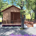 Rustic Wooden Cabin Surrounded by Lush Green Trees With Front Deck and Lavender Plants