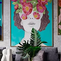 Modern Sectional Sofa with Decorative Pillows Green Plants and Wall Art