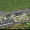Aerial View of Modern Station With Spacious Parking Lot Lush Greenery and Surrounding Forest