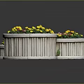 Three Circular Wooden Planters With Lush Yellow And Red Flowers And Green Plants