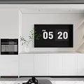 Modern Apartment Interior With White Cabinets TV Digital Clock Display And Green Plant
